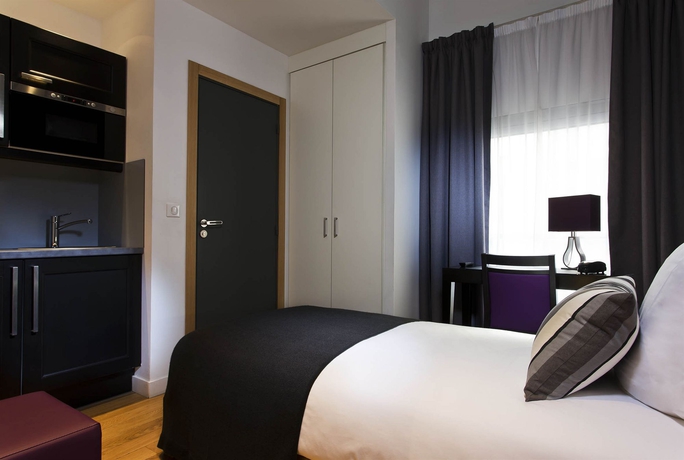 Imagen de la habitación del Hotel Ambre Hotel. Foto 4