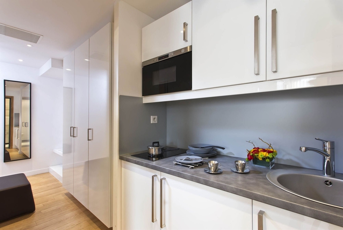 Imagen de la habitación del Hotel Ambre Hotel. Foto 7