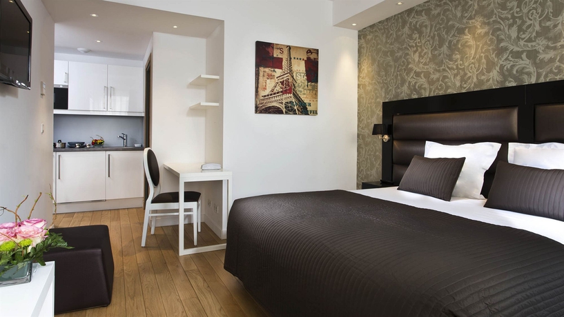 Imagen de la habitación del Hotel Ambre Hotel. Foto 8