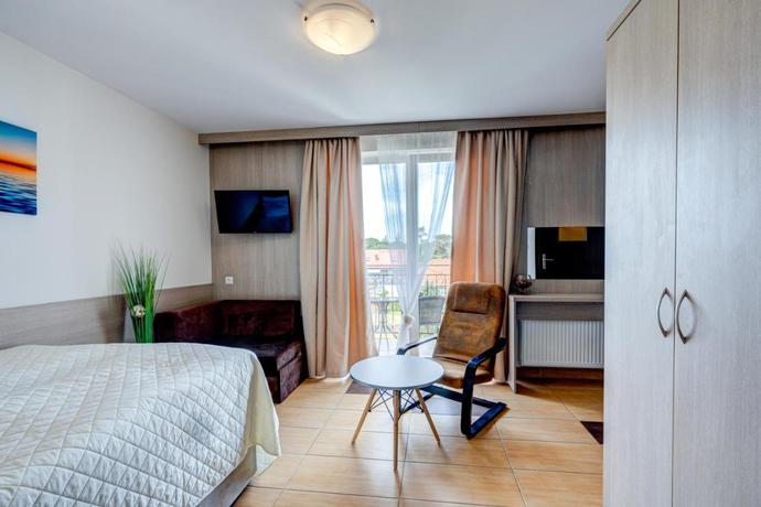 Imagen de la habitación del Hotel Ambre Mare - Wypoczynek Pod Palmami. Foto 5