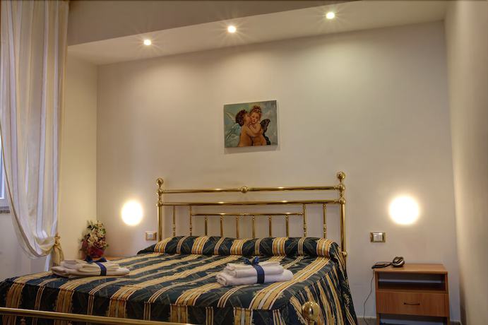 Imagen de la habitación del Hotel Ambrogini. Foto 11