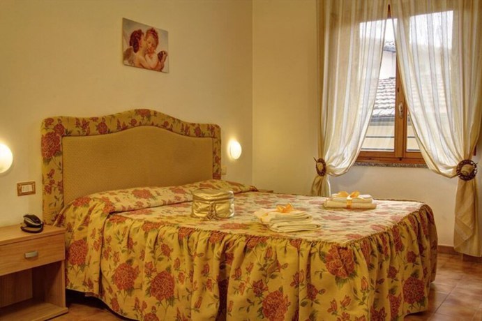 Imagen de la habitación del Hotel Ambrogini. Foto 14
