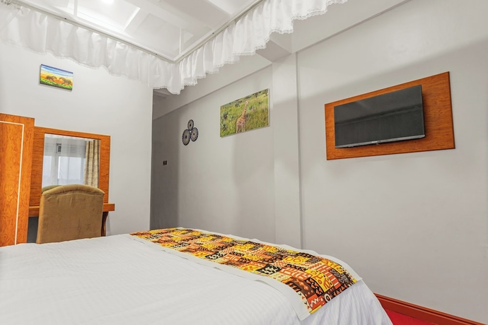 Imagen de la habitación del Hotel Ambrosia Heights Entebbe. Foto 10