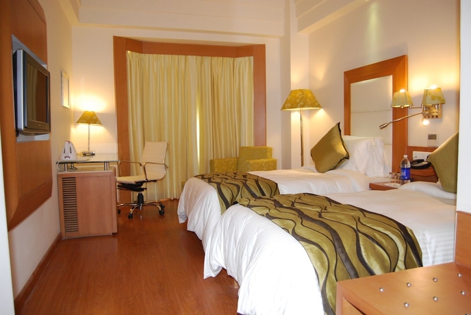 Imagen de la habitación del Hotel Ambrosia Sarovar Portico Haridwar. Foto 7
