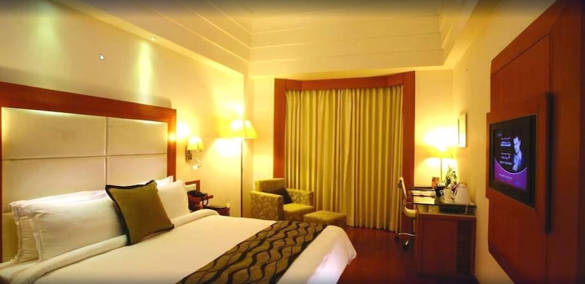 Imagen de la habitación del Hotel Ambrosia Sarovar Portico Haridwar. Foto 8