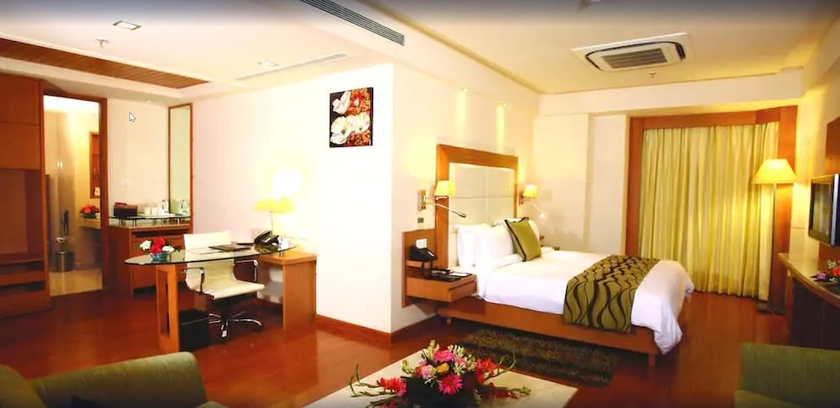 Imagen de la habitación del Hotel Ambrosia Sarovar Portico Haridwar. Foto 11