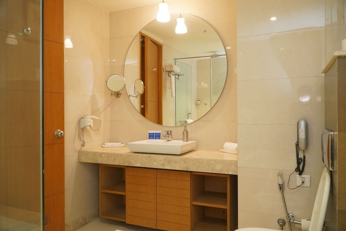 Imagen de la habitación del Hotel Ambrosia Sarovar Portico Haridwar. Foto 12