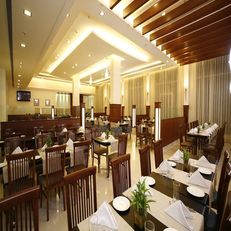 Imagen del bar/restaurante del Hotel Ambrosia Sarovar Portico Haridwar. Foto 4