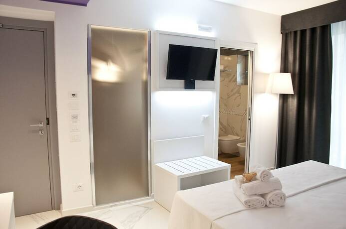 Imagen de la habitación del Hotel Ambruosi Village Resort and Spa. Foto 11