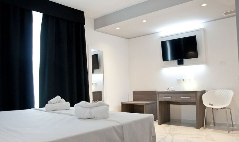 Imagen de la habitación del Hotel Ambruosi Village Resort and Spa. Foto 12