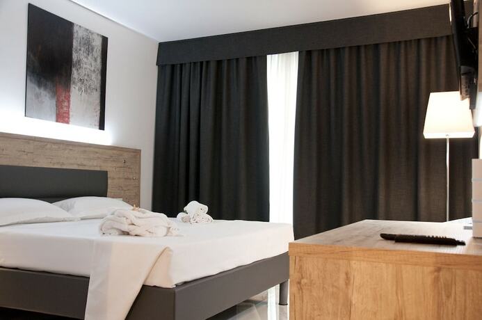 Imagen de la habitación del Hotel Ambruosi Village Resort and Spa. Foto 14