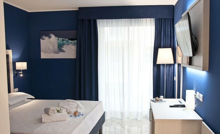 Imagen de la habitación del Hotel Ambruosi Village Resort and Spa. Foto 15