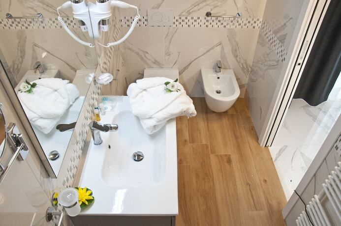 Imagen de la habitación del Hotel Ambruosi Village Resort and Spa. Foto 19
