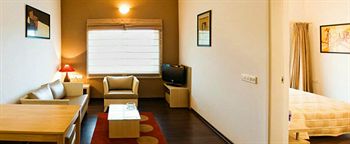 Imagen de la habitación del Hotel Amc Comforts At Brigade Homestead. Foto 3