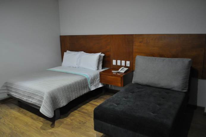 Imagen de la habitación del Hotel Amd. Foto 7