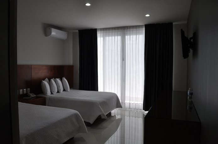 Imagen de la habitación del Hotel Amd. Foto 9