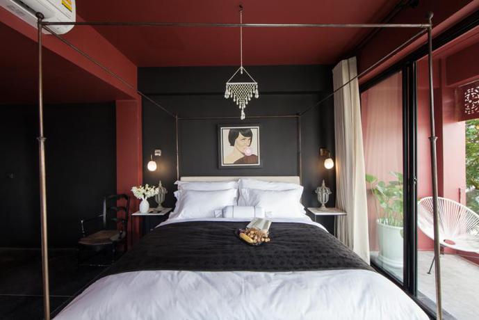 Imagen de la habitación del Hotel Amdaeng Bangkok Riverside. Foto 3