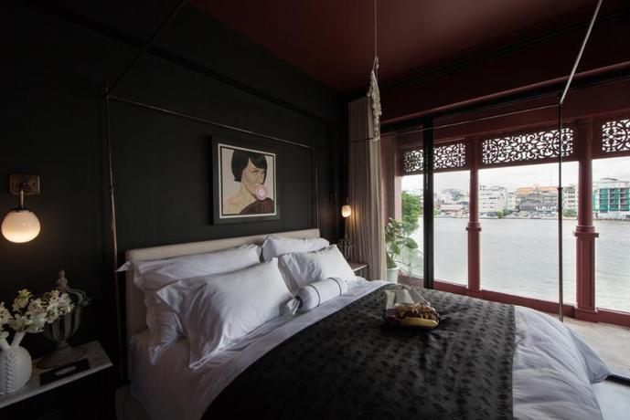 Imagen de la habitación del Hotel Amdaeng Bangkok Riverside. Foto 5