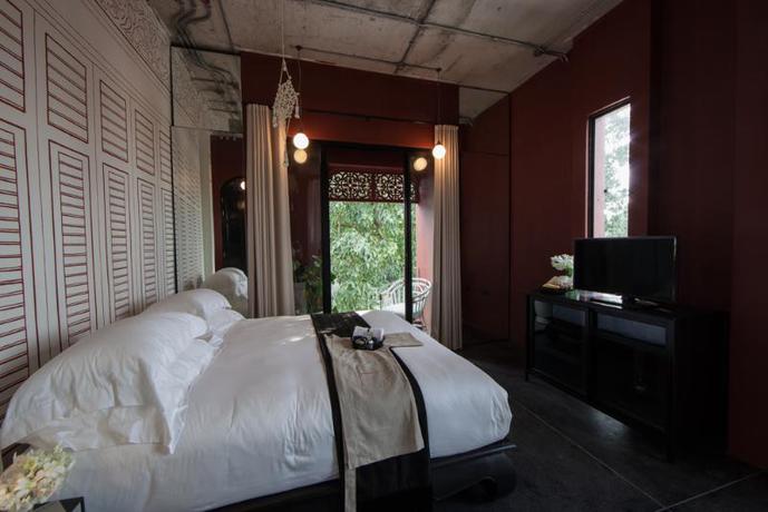 Imagen de la habitación del Hotel Amdaeng Bangkok Riverside. Foto 6