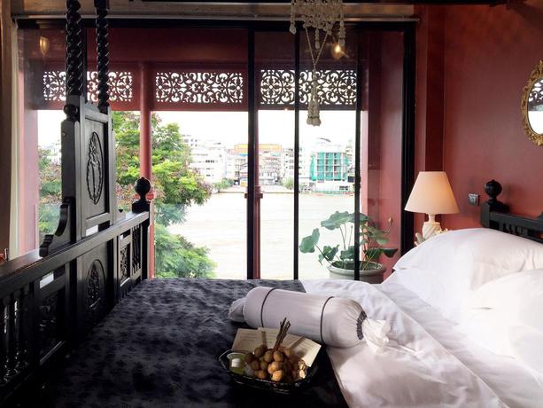 Imagen de la habitación del Hotel Amdaeng Bangkok Riverside. Foto 7