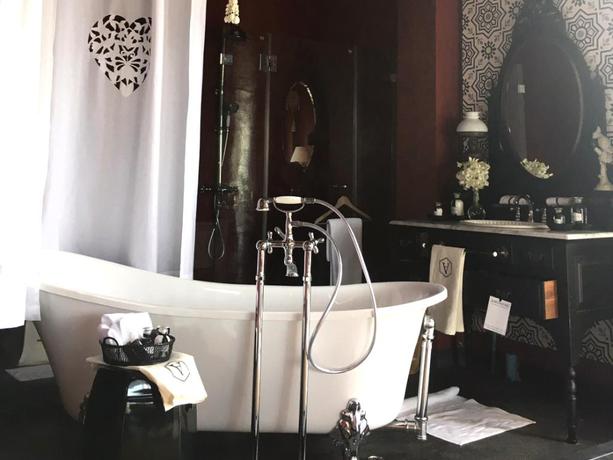 Imagen de la habitación del Hotel Amdaeng Bangkok Riverside. Foto 8