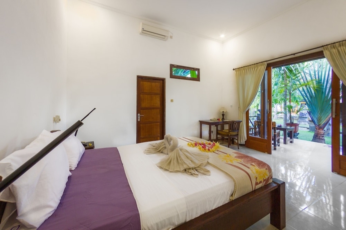 Imagen de la habitación del Hotel Amed Oasis. Foto 11
