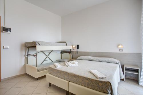 Imagen de la habitación del Hotel Amedea. Foto 8