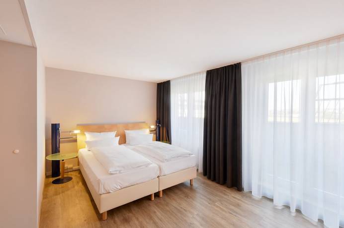 Imagen de la habitación del Hotel Amedia Dresden Elbpromenade, Trademark Collection By Wyndham. Foto 17