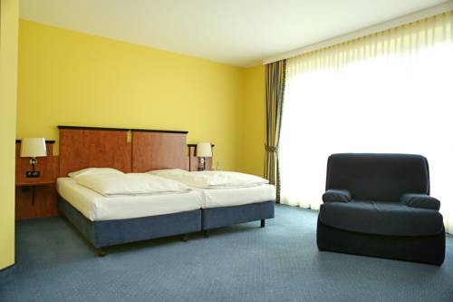 Imagen de la habitación del Hotel Amedia Frankfurt Russelsheim Trademark Collection By Wyndham. Foto 6