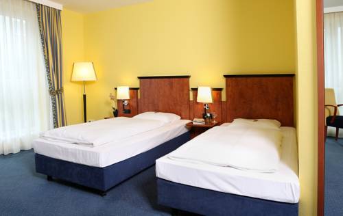 Imagen de la habitación del Hotel Amedia Frankfurt Russelsheim Trademark Collection By Wyndham. Foto 9