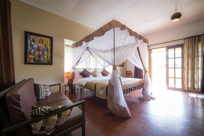Imagen de la habitación del Hotel Ameg Lodge Kilimanjaro. Foto 17