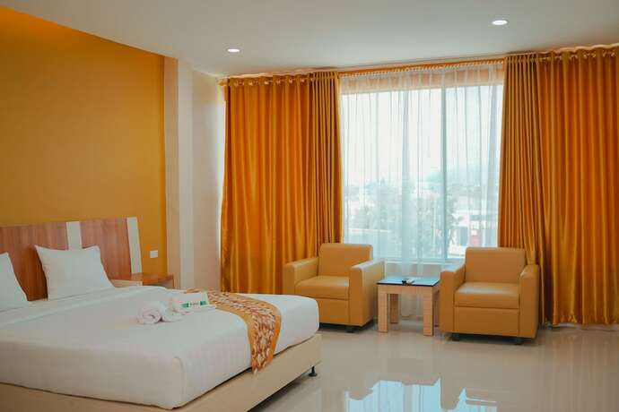 Imagen de la habitación del Hotel Amel Convention Hall. Foto 10