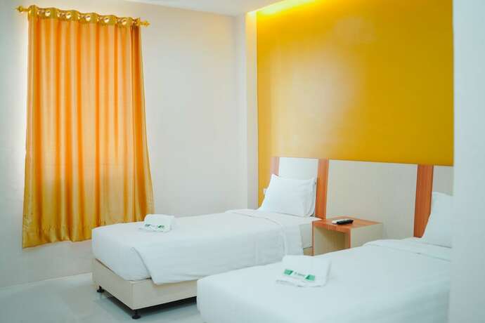 Imagen de la habitación del Hotel Amel Convention Hall. Foto 12