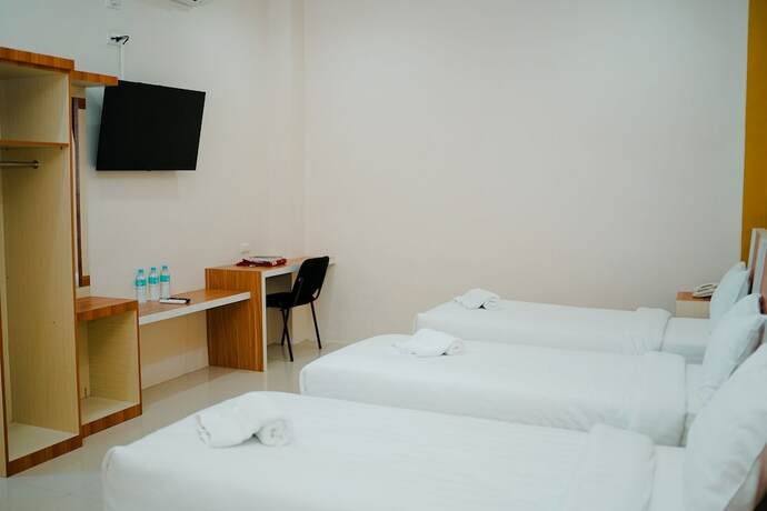 Imagen de la habitación del Hotel Amel Convention Hall. Foto 14