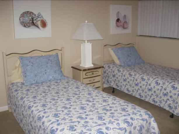 Imagen de la habitación del Hotel Amelia By The Sea Rentals. Foto 9