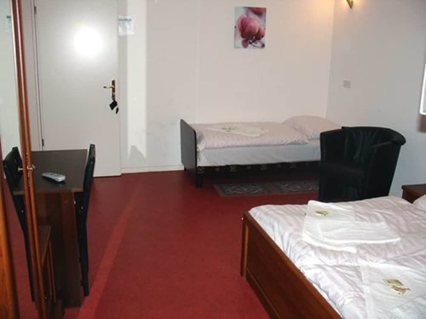 Imagen de la habitación del Hotel Amelie Berlin. Foto 5