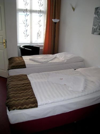 Imagen de la habitación del Hotel Amelie Berlin. Foto 9