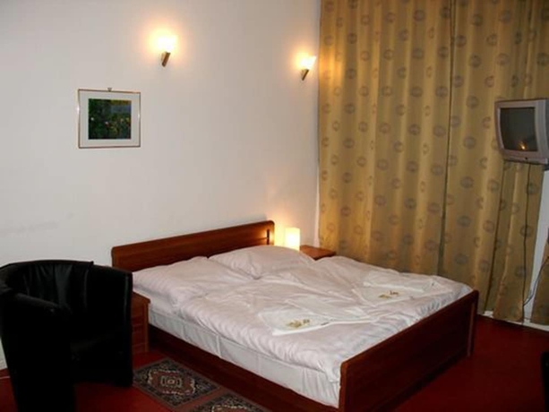 Imagen de la habitación del Hotel Amelie Berlin. Foto 10