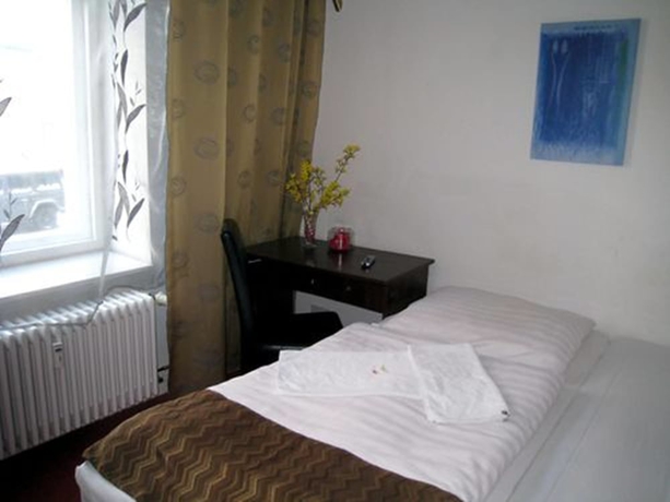 Imagen de la habitación del Hotel Amelie Berlin. Foto 13