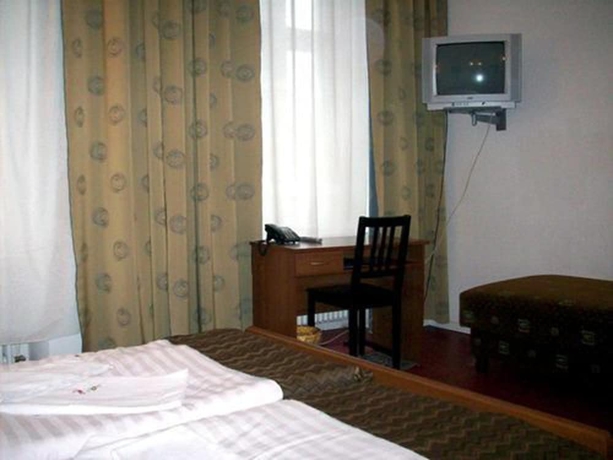 Imagen de la habitación del Hotel Amelie Berlin. Foto 15