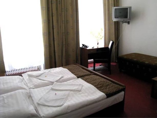 Imagen de la habitación del Hotel Amelie Berlin. Foto 17