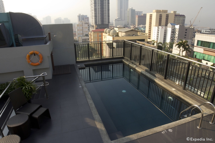 Imagen de la piscina del Hotel Amelie Manila. Foto 16