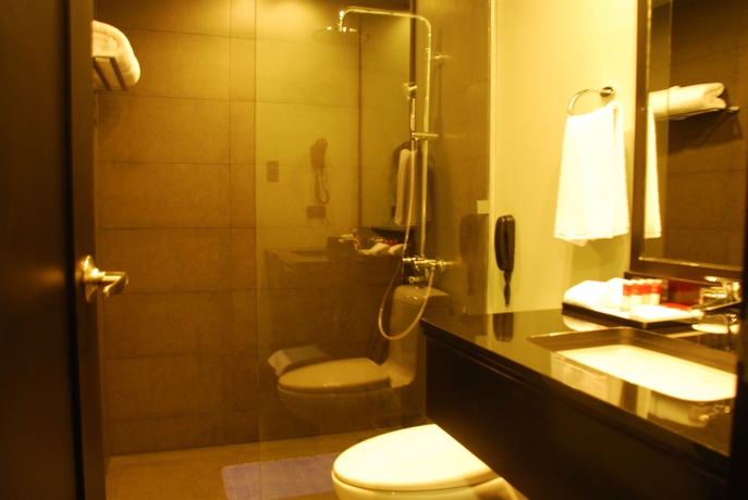 Imagen de la habitación del Hotel Amelie Manila. Foto 4
