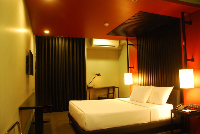 Imagen de la habitación del Hotel Amelie Manila. Foto 5