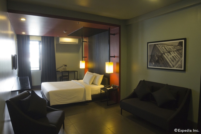 Imagen de la habitación del Hotel Amelie Manila. Foto 8