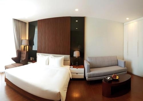 Imagen de la habitación del Hotel Amena Residences & Suites Managed By Melia. Foto 7