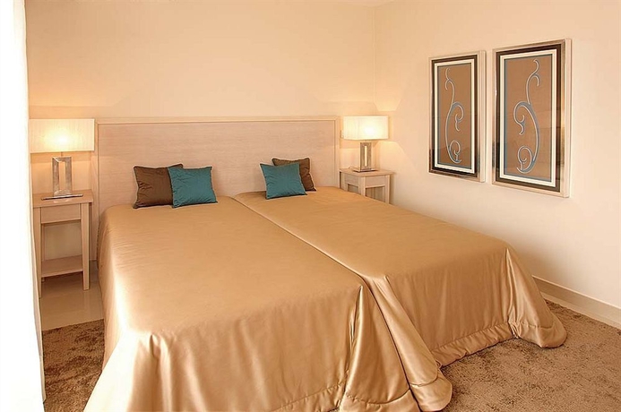 Imagen de la habitación del Hotel Amendoeira Golf Resort. Foto 6