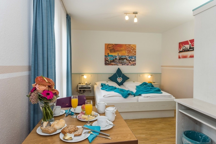 Imagen de la habitación del Hotel Amenity München. Foto 12