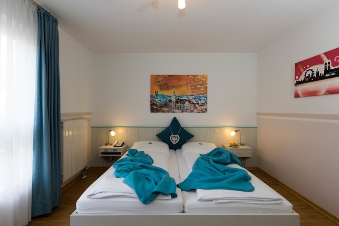 Imagen de la habitación del Hotel Amenity München. Foto 13