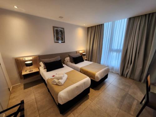 Imagen de la habitación del Hotel Amerian Rio Cuarto Apart & Suites. Foto 15